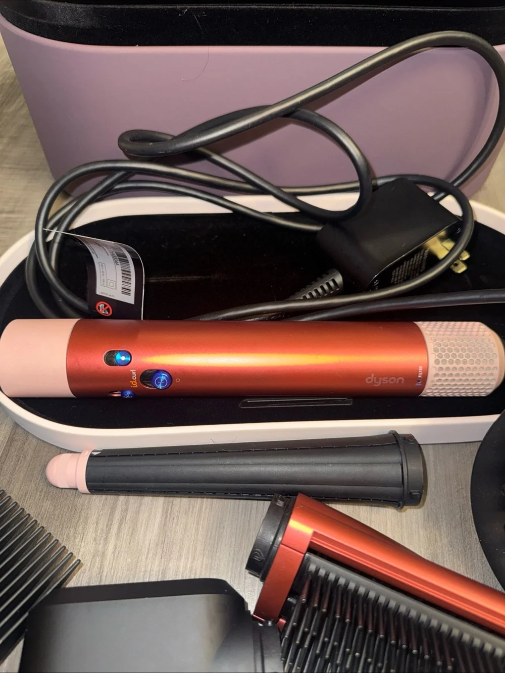 Dyson Airwrap i.d. multi-styler strawberry bronze/ blush pink used with case